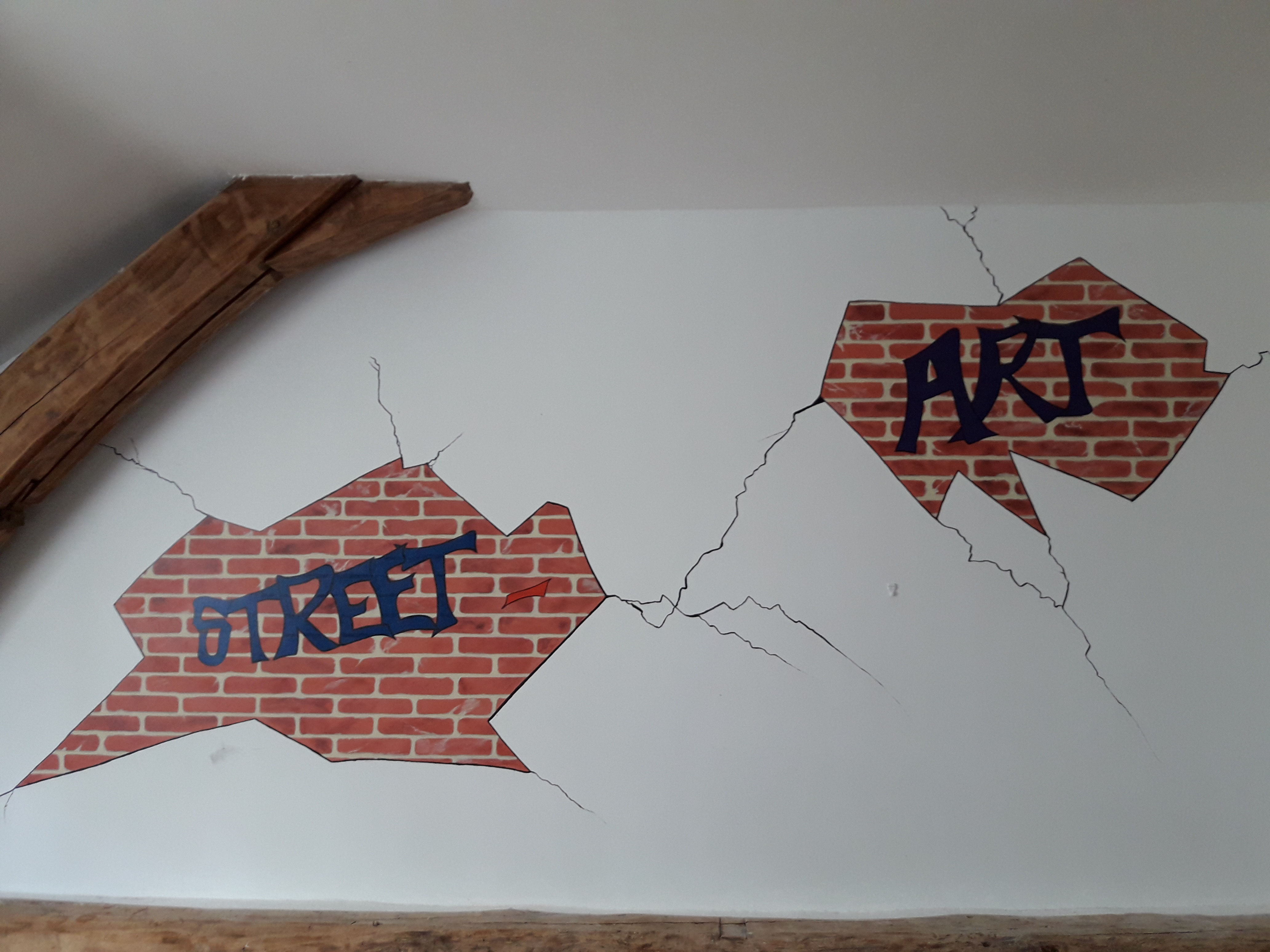 Briquettes en trompe l'oeil dans une chambre d'ado.